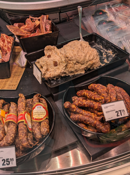 some meat paste presented in the supermarket is shaped into the head of a pig