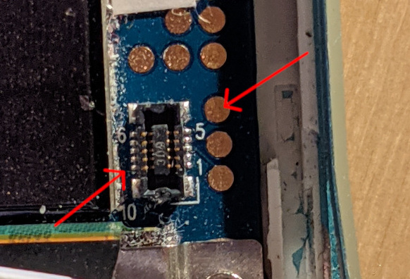 The previous image with two additional arrows pointing to lines 4 and 9 indicating which lines need to be connected to trigger a boot